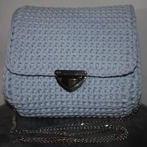 Handmade baby-blue crochet shoulder bag with a black-nickel clasp and chain strap