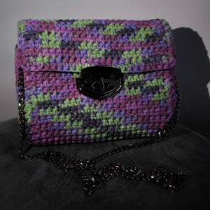 Handmade crochet bag with a colourful funky pattern and a black-nickel clasp