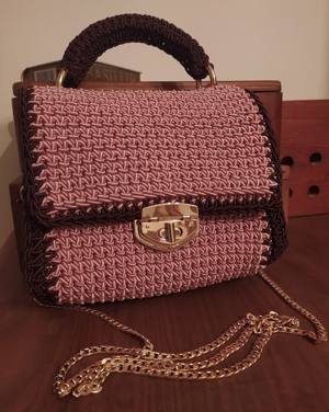 Handmade two-tone salmon and brown crochet bag with a gold clasp